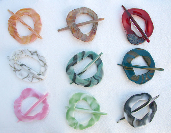 Moving Mud Shawl Pin Newsprint